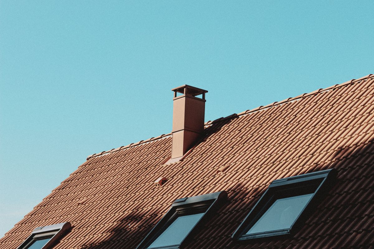 Intersecting roof planes with a chimney and roof windows